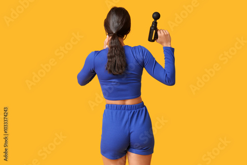 Sporty young woman using pe...