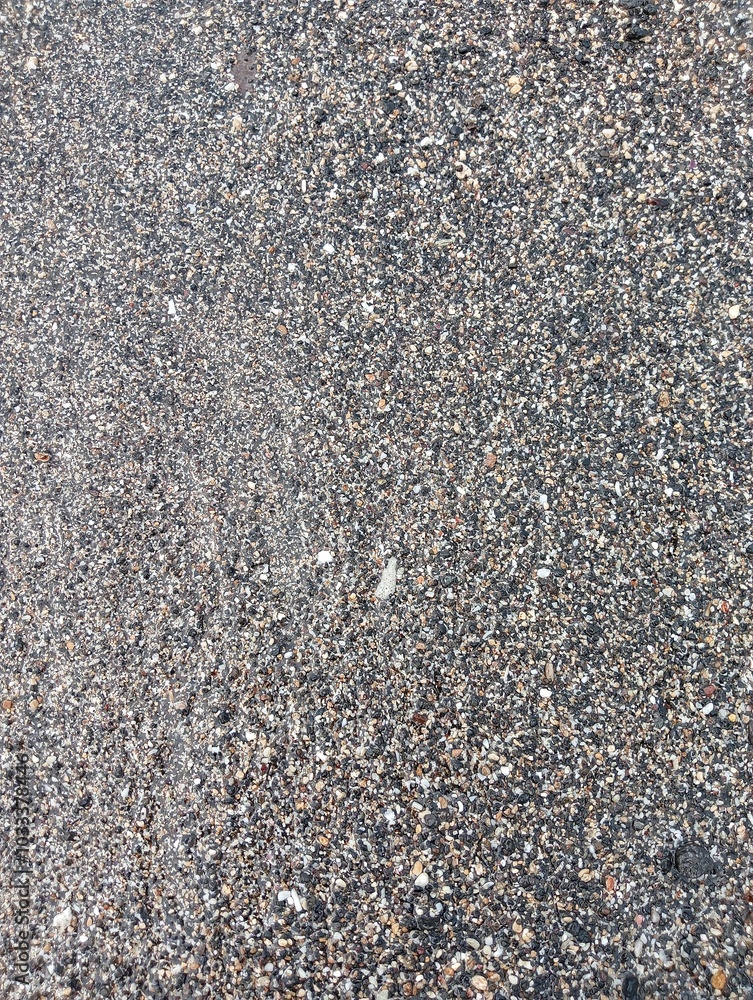 Portrait of sand and small rocks on the beach Portrait of sand and small rocks on the beach
