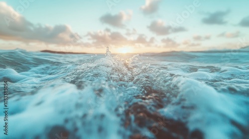 The calm ocean waves create a peaceful ambience as they ripple under a serene sunset sky, blending the beauty of water and sky in a harmonious dance. photo