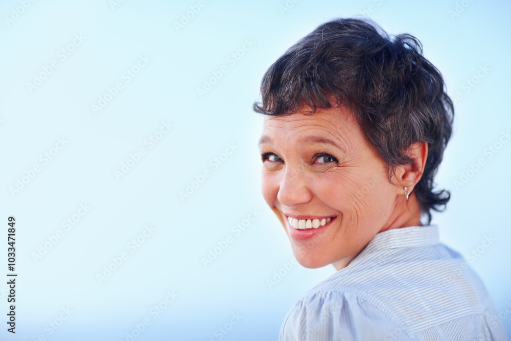 Mature, happy woman and smile portrait on blue sky for holiday, travel or vacation in retirement. Confidence, mockup and space with tourist person outdoor in summer for peace, sightseeing or wellness Mature, happy woman and smile portrait on blue sky for holiday, travel or vacation in retirement. Confidence, mockup and space with tourist person outdoor in summer for peace, sightseeing or wellness