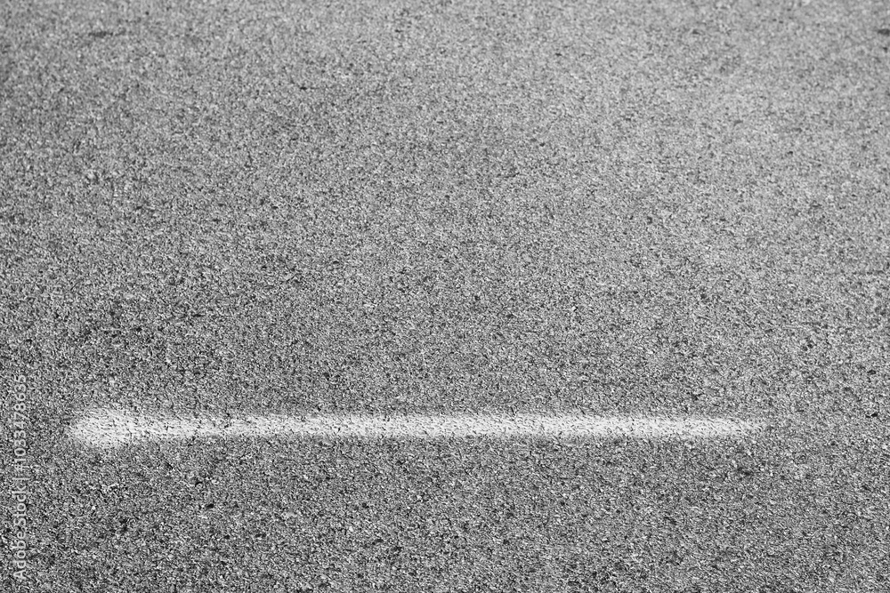 Fototapeta premium asphalt background of a white line
