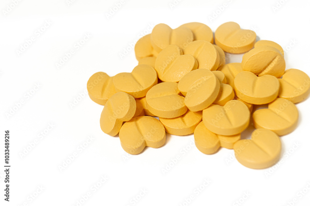 Heart medication pills on a clean white background. Ideal for medical, healthcare, or pharmaceutical concepts, highlighting treatment and cardiovascular health. Heart medication pills on a clean white background. Ideal for medical, healthcare, or pharmaceutical concepts, highlighting treatment and cardiovascular health.