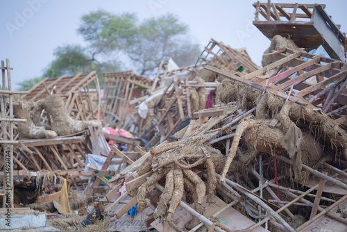 Durga Visarjan Idol Debris, Aftermath of Durga Puja Visarjan, Durga Idol Immersion Remnants, Discarded Durga Puja Structures, Idol Remnants Post Visarjan Stock Photo. photo