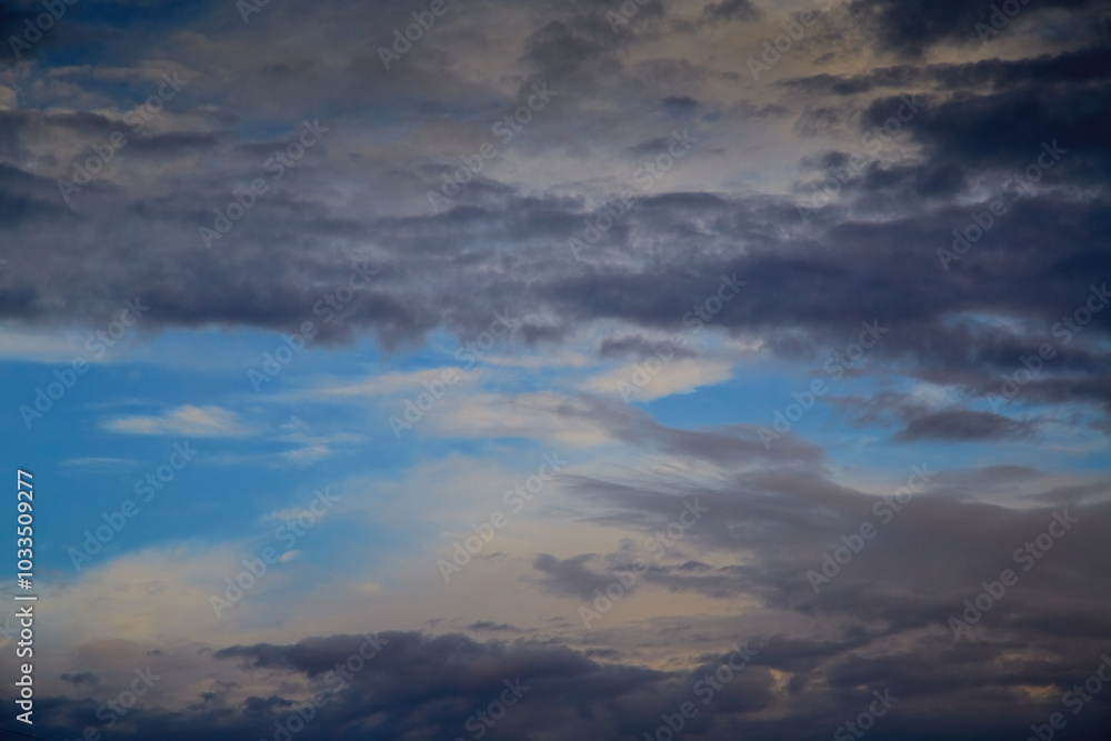 Panoramic view of the sky with clouds covering it, changing weather, sky background. Panoramic view of the sky with clouds covering it, changing weather, sky background.