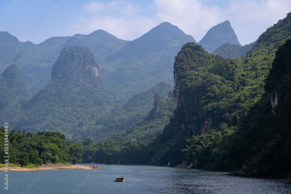 Guilin, China: Karst landscape of the Li river between Guilin and Yangshuo in southern China on a sunny day.
