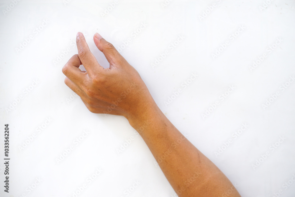 A hand making a pinching gesture, with the thumb and index finger close together, isolated on a plain white background. Ideal for concepts of holding, precision, or measurement. A hand making a pinching gesture, with the thumb and index finger close together, isolated on a plain white background. Ideal for concepts of holding, precision, or measurement.