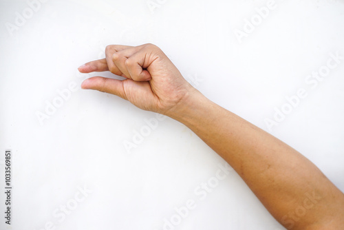 A hand making a pinching gesture, with the thumb and index finger close together, isolated on a plain white background. Ideal for concepts of holding, precision, or measurement.