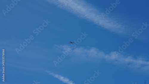 The blue sky view with the flying trail by the aircraft 