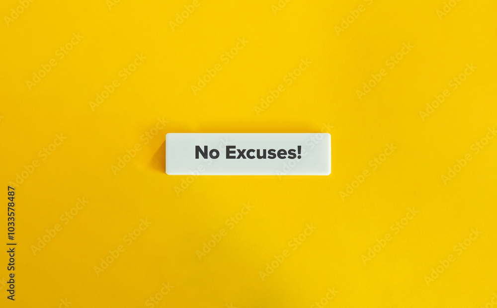 No Excuses! Text on Block Letter Tile on Yellow Background. Minimal Aesthetic. No Excuses! Text on Block Letter Tile on Yellow Background. Minimal Aesthetic.