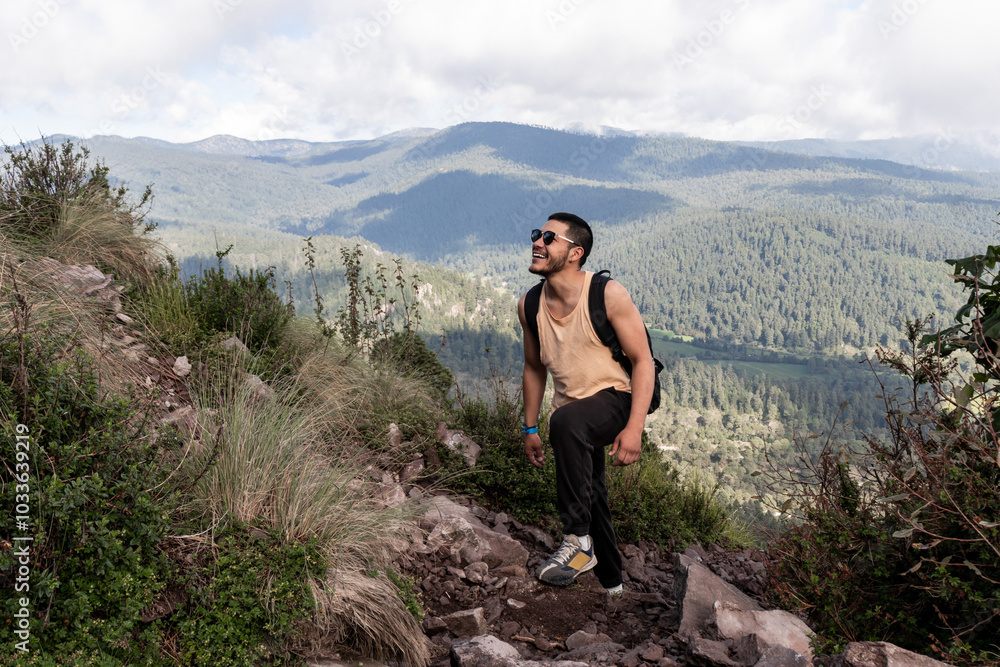 Hiker enjoying scenic view at Cumbres del Ajusco, Mexico City Hiker enjoying scenic view at Cumbres del Ajusco, Mexico City