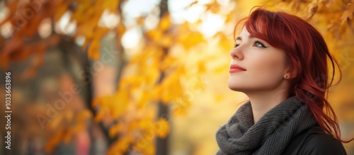 Woman with red hair in autumn leaves, gazing thoughtfully, warm colors