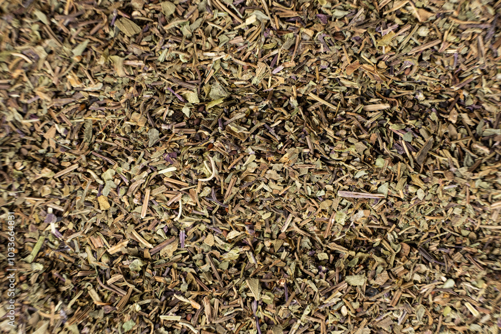 Dry basil spice seasoning macro texture top view Dry basil spice seasoning macro texture top view