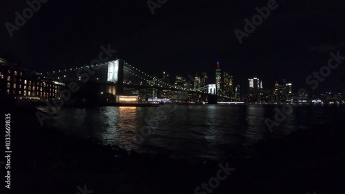 Manhattan skyline seen from the Brooklyn at night. New York, USA