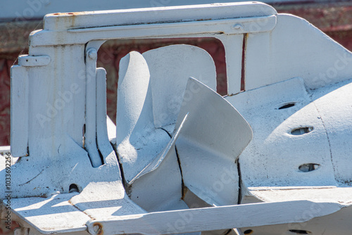 Huge ship engine from a torpedo boat detail. The tail of a naval military torpedo with a propeller. Part of the weapon in close up. Metal weapons. Arms supplies for Ukraine. photo