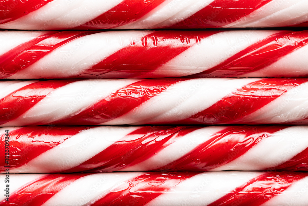 Close-up of red and white striped candy canes Close-up of red and white striped candy canes