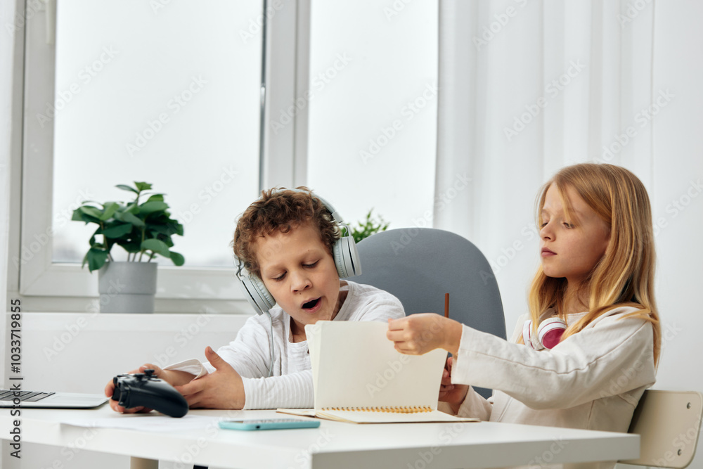 Happy siblings taking a selfie while playing with their smartphones at home, capturing their bond and connection in the digital world