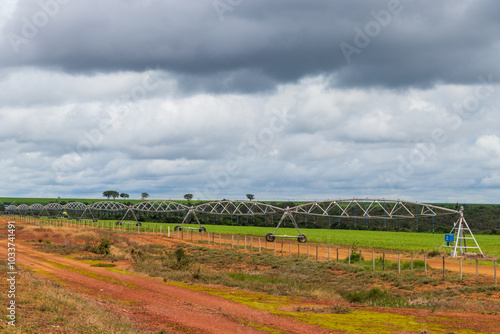 irrigation pivot under cloudy sky