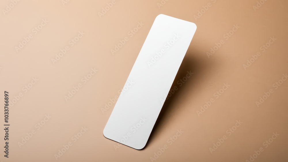Realistic bookmark mockup featuring a simple, rectangular design. Perfect for showcasing book-related designs or promotional materials in a clean, minimal setting Realistic bookmark mockup featuring a simple, rectangular design. Perfect for showcasing book-related designs or promotional materials in a clean, minimal setting