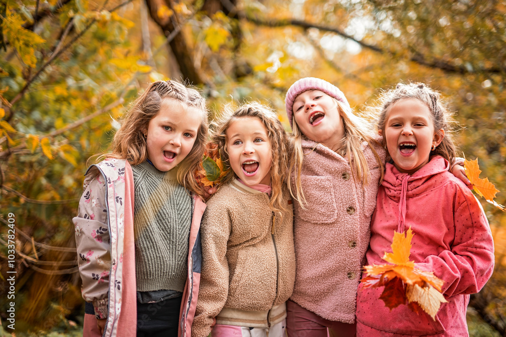 Group Of Young Children having fun on Autumn Forest Group Of Young Children having fun on Autumn Forest