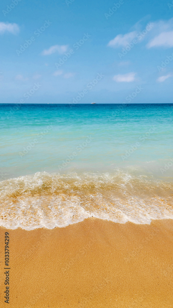 Beautiful view on blue sky and azure coast sea with soft blue ocean wave. Vertical photo. High quality photo Beautiful view on blue sky and azure coast sea with soft blue ocean wave. Vertical photo. High quality photo