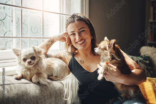 Photography Woman, home and dogs with portrait on living room sofa with relax, calm and break with pet and care