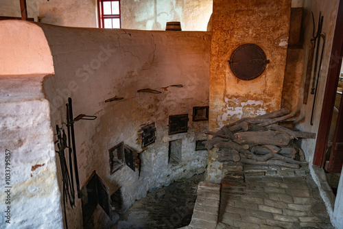 old wood-fired ovens where the barrels were placed for wool dyed photo