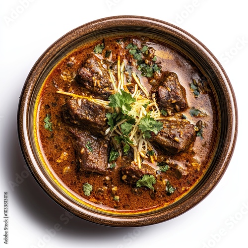 Top view of a porcelain dish with nihari isolated on white background