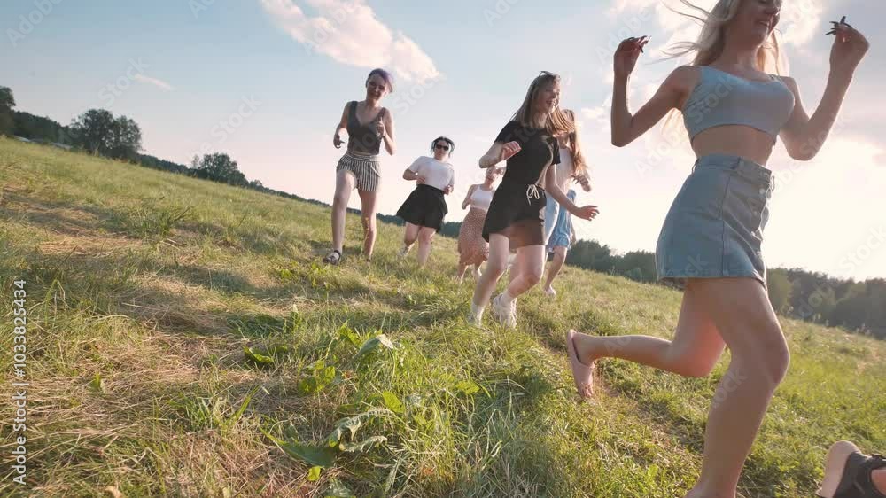 Excited graduates play soccer on a sunny field, celebrating achievement and future success with friends Excited graduates play soccer on a sunny field, celebrating achievement and future success with friends