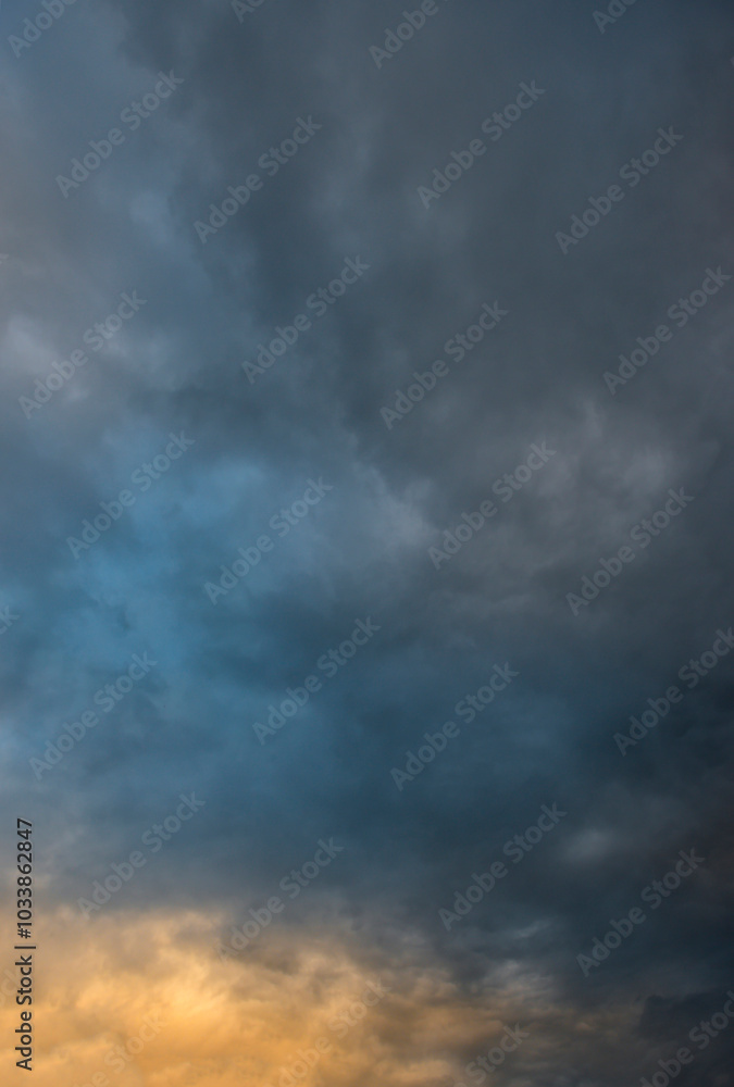 Russia. The South of Western Siberia. Panorama of the evening summer sky with multicolored clouds over the fields of Kuznetsk Alatau. Russia. The South of Western Siberia. Panorama of the evening summer sky with multicolored clouds over the fields of Kuznetsk Alatau.