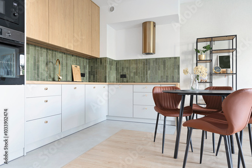 Photography Modern interior of design kitchen with dining table and chair and stylish eaves with tile on the wall