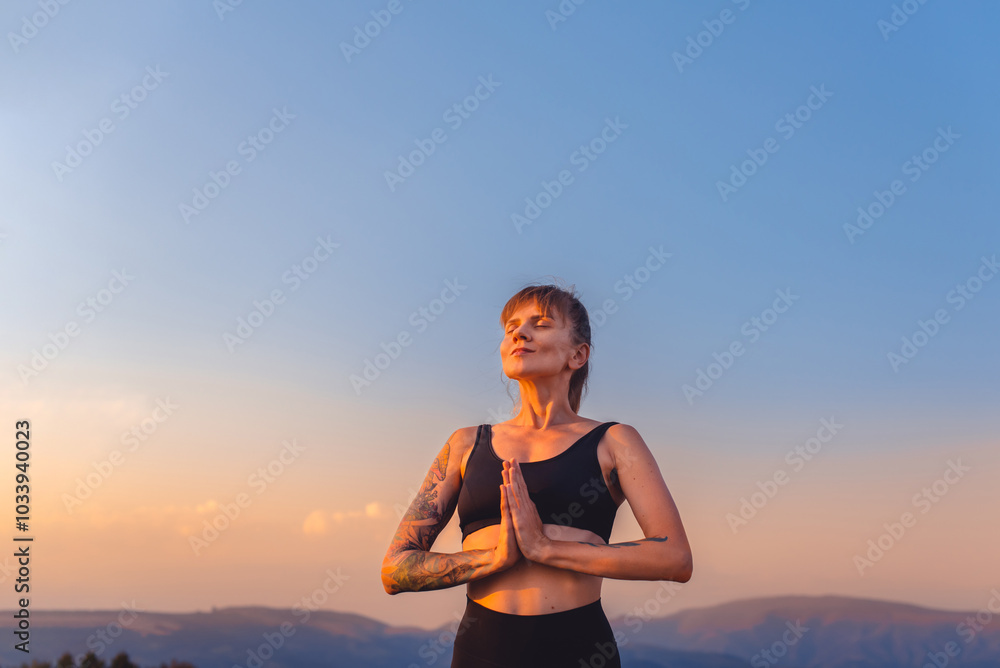 Woman Practicing Breathing Yoga on Nature at Sunset