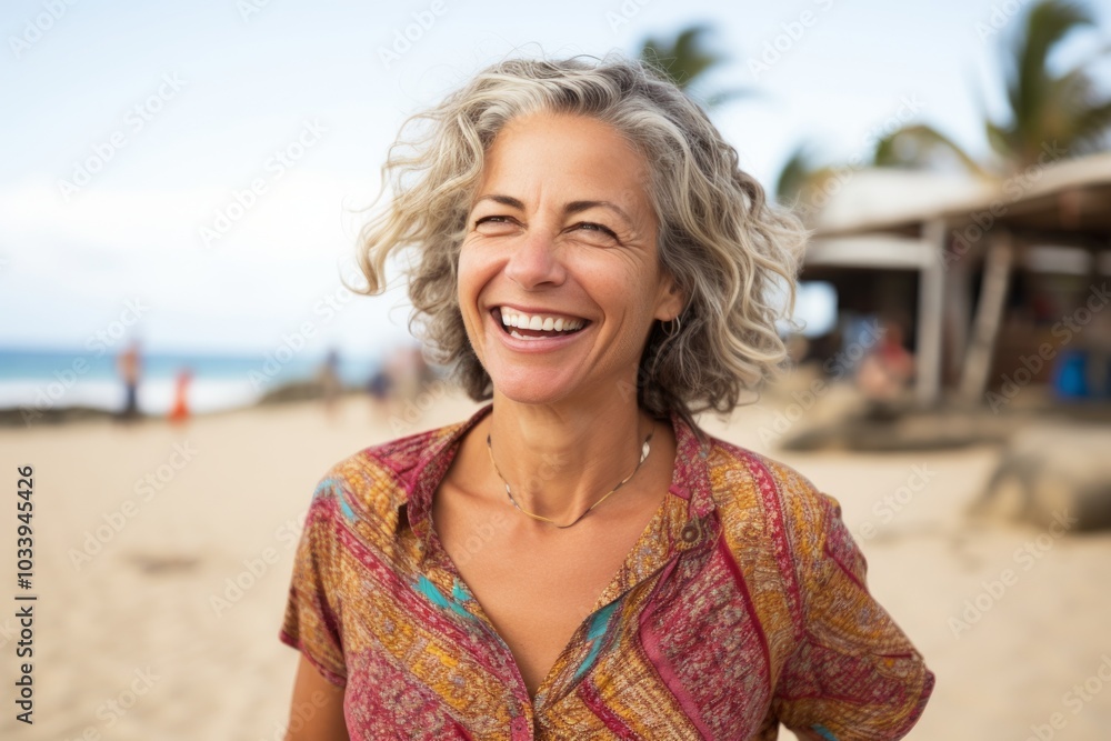Portrait of a smiling woman in her 50s sporting a breathable hiking shirt in front of bustling beach resort background Portrait of a smiling woman in her 50s sporting a breathable hiking shirt in front of bustling beach resort background