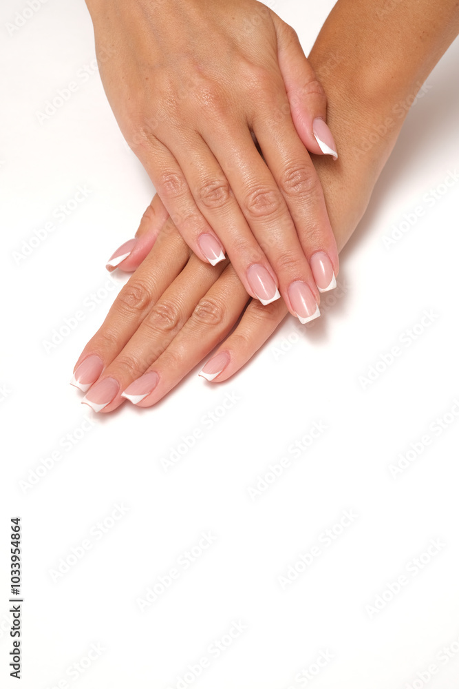 Beautiful feminine hands with French manicure. Beautiful feminine hands with French manicure.