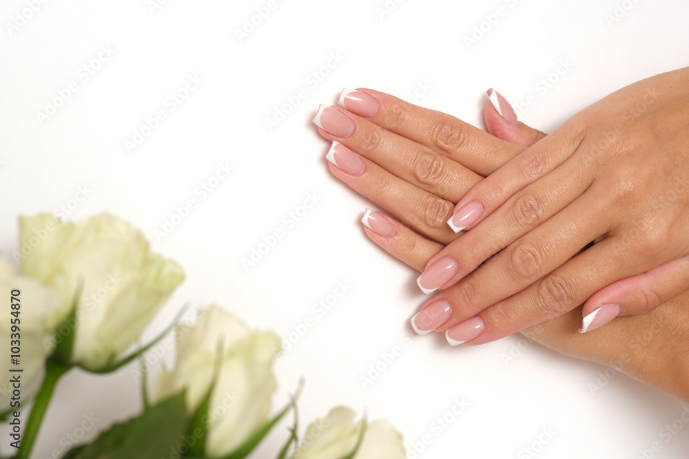 Beautiful feminine hands with French manicure. Beautiful feminine hands with French manicure.