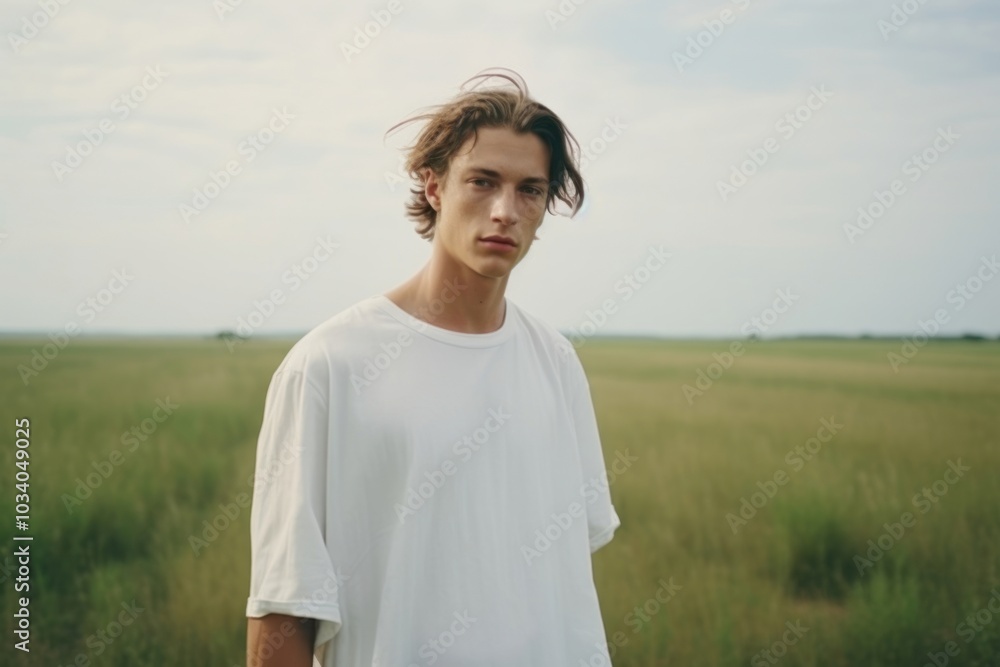 A men wear white portrait photography outdoors. A men wear white portrait photography outdoors.