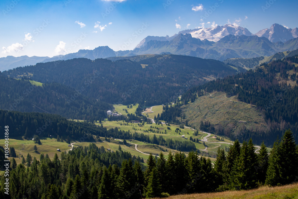 Fototapeta premium Panoramic view of Marmolada Mountain and Glacier, from Col Alt over Corvara, Alta Badia, Dolomites , Trentino, Alto Adige, Sudtirol, South Tyrol, Italy