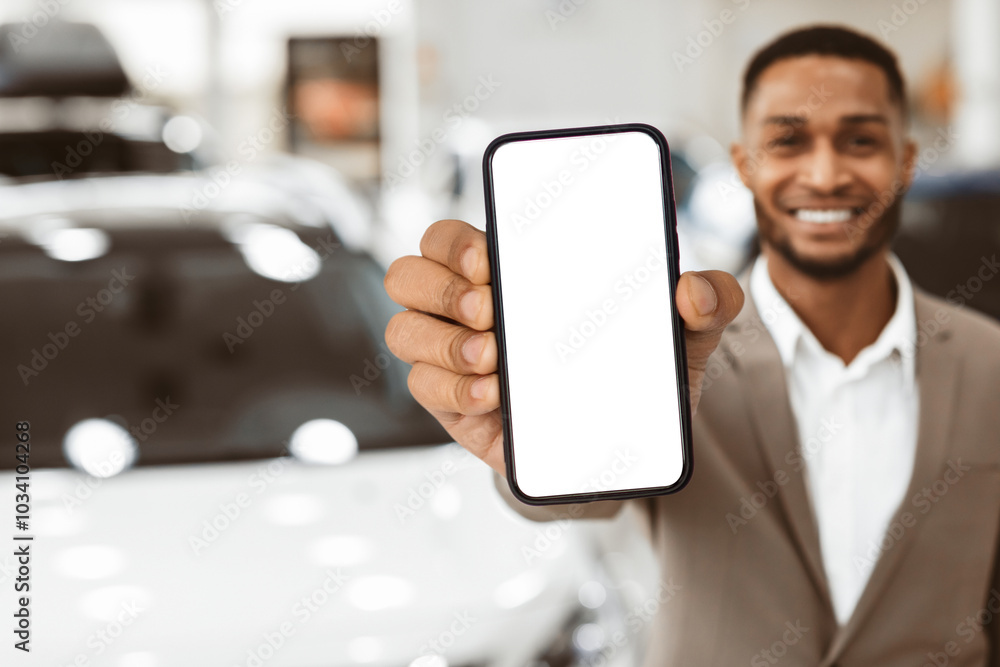 Car Rental. Unrecognizalble Agent Showing Auto Key Standing In Automobile Rental Office. Empty Space, Shallow Depth Car Rental. Unrecognizalble Agent Showing Auto Key Standing In Automobile Rental Office. Empty Space, Shallow Depth