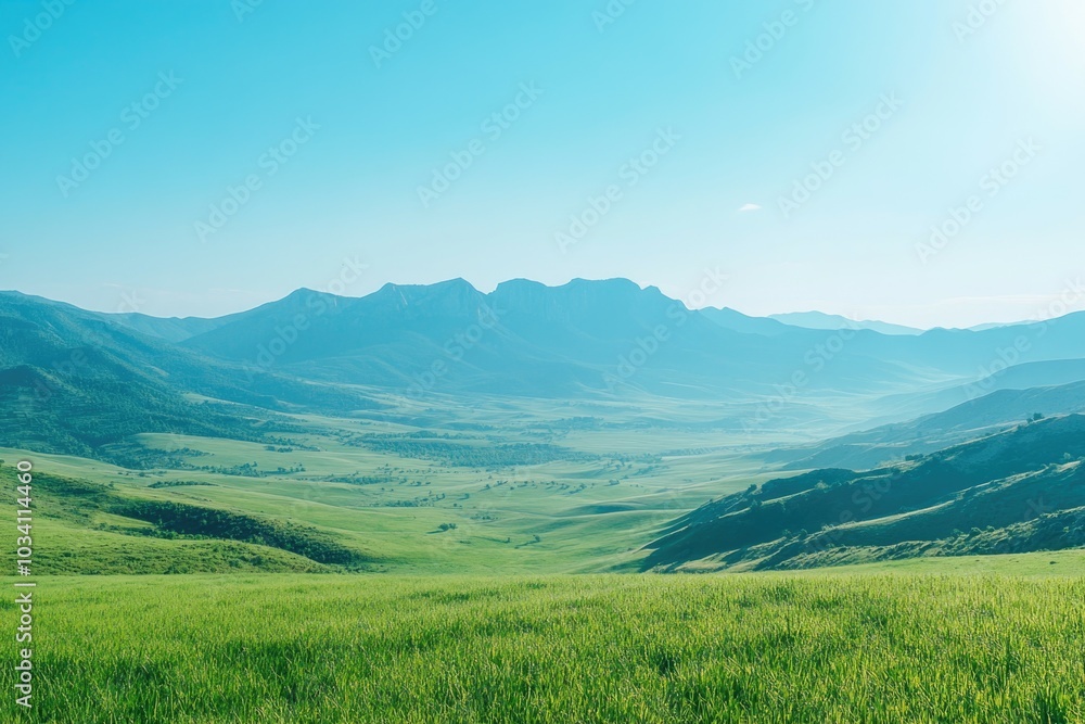 Fototapeta premium Serene mountain landscape under a clear blue sky