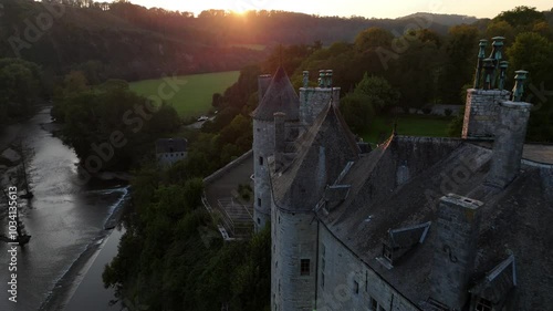 Discovering the enchanting beauty of Walzin Castle at sunset photo