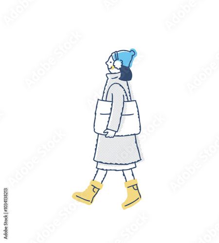 歩いている冬服の若い女性