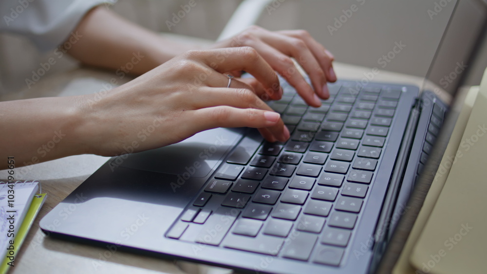 Girl fingers pressing keyboard laptop keys at desk closeup. Woman hands working Girl fingers pressing keyboard laptop keys at desk closeup. Woman hands working