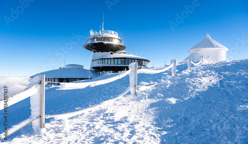 Fototapeta Naklejka Na Ścianę i Meble -  summit of Sniezka mountain during sunny winter day in Poland and Czech republic border