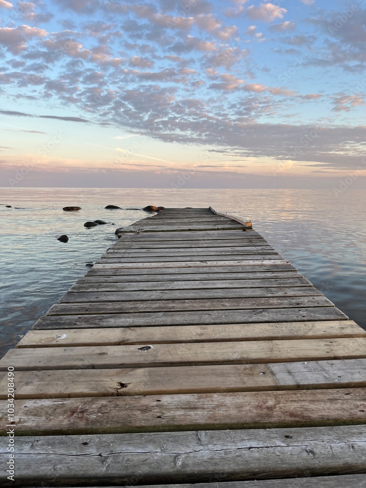 Fototapeta premium wooden pier at sunset