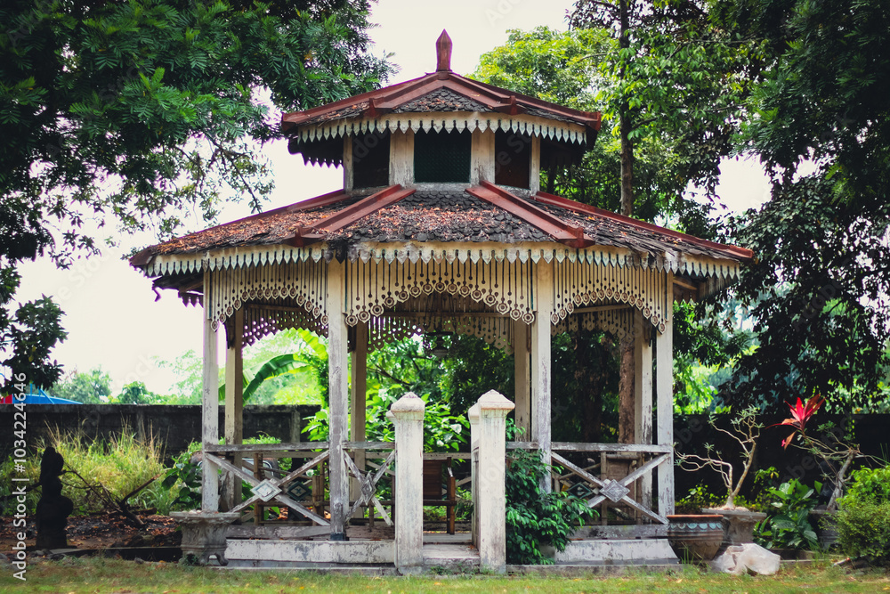 Traditional Gazebo Surrounded by Lush Greenery Traditional Gazebo Surrounded by Lush Greenery