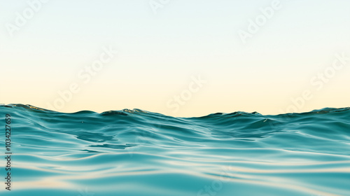 Tranquil ocean waves against a clear horizon at sunset