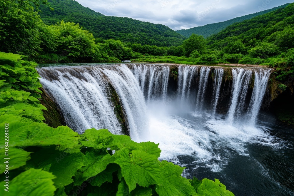 A hidden waterfall in the Tirana countryside, surrounded by lush greenery