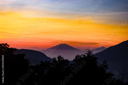 Stunning Mountain Sunset Over Hills