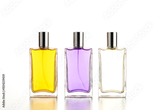 Elegant Trio of Perfume Bottles with Luxurious Design Displayed on a White Background