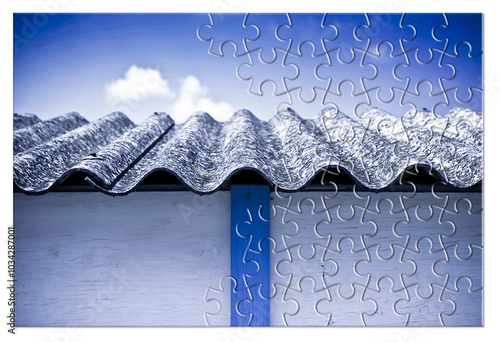 Asbestos removal  - Solution concept with an old asbestos roof panels in jigsaw puzzle shape photo