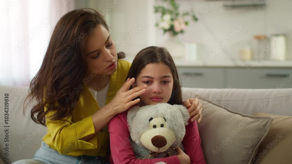 Worried Caucasian parent woman feel guilty female mother apologizing ask forgiveness little girl after quarrel argument calming sad child hugging saying sorry to crying kid daughter indoor living room Worried Caucasian parent woman feel guilty female mother apologizing ask forgiveness little girl after quarrel argument calming sad child hugging saying sorry to crying kid daughter indoor living room